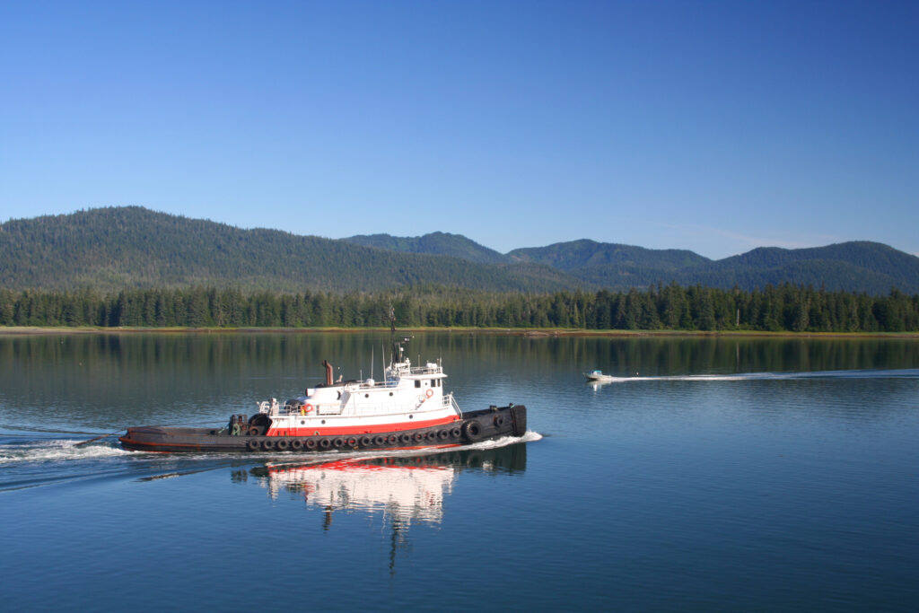 tugboat and small boat on Wrangell Narrows in Alaska